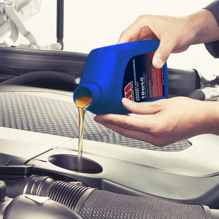 Photo of Trident Professional being poured into a car engine
